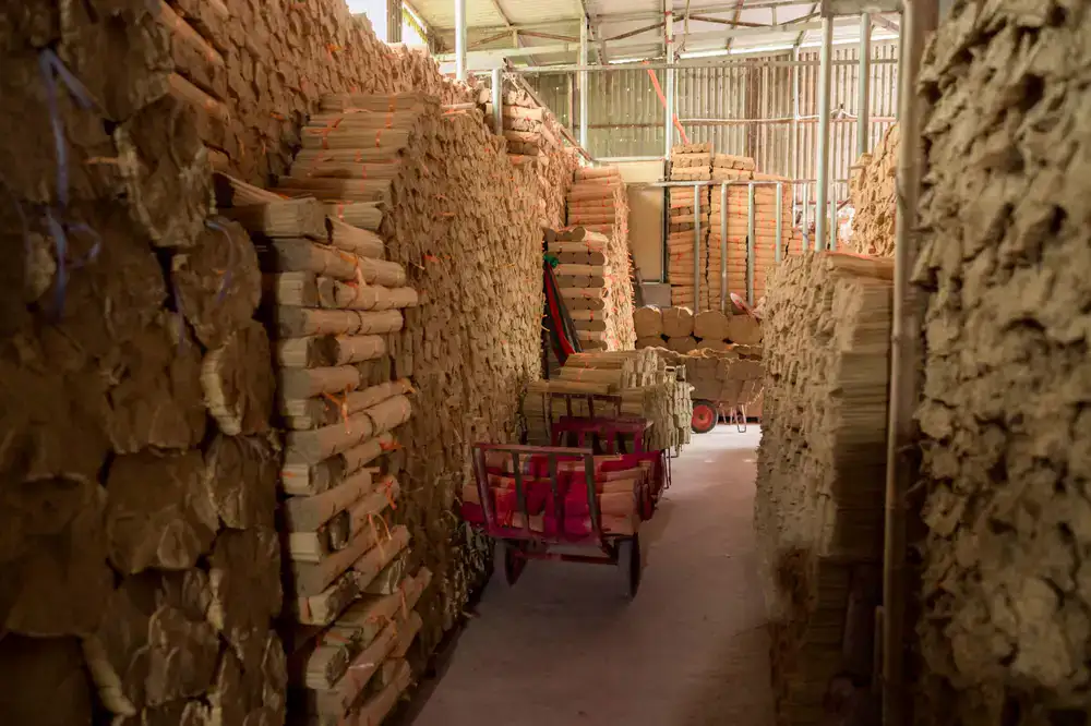 Stacks of carefully wrapped paper bundles prepared for wholesale shipping